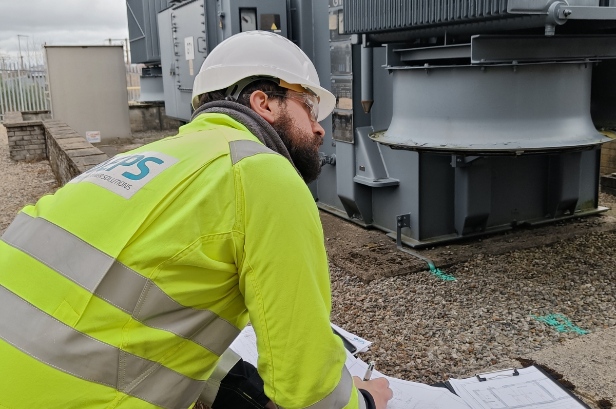 An EPS electrical engineering consultant on site conducting an electrical site survey.